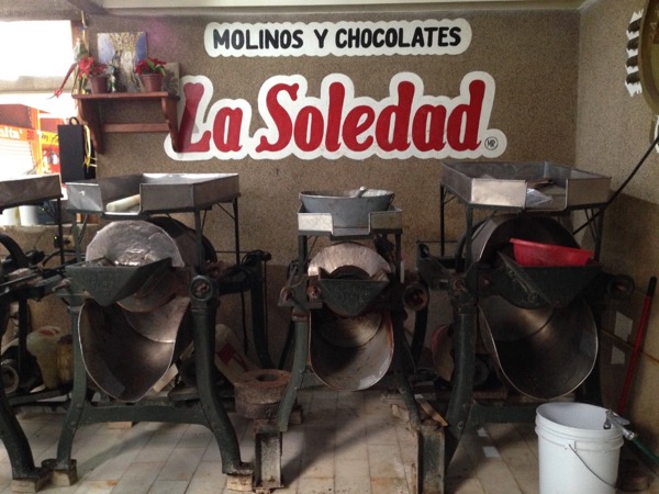 three molinos for grinding cacao
