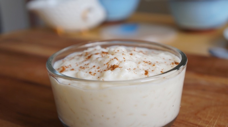 arroz con leche with cinnamon sprinkled on top
