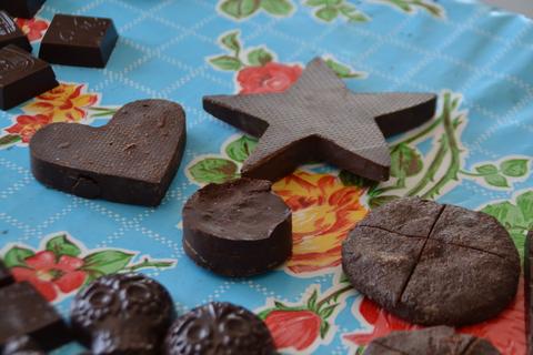 chocolate star, chocolate heart, and assorted chocolate on table