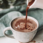 cardamom hot chocolate, cup of chocolate, cardamom pods