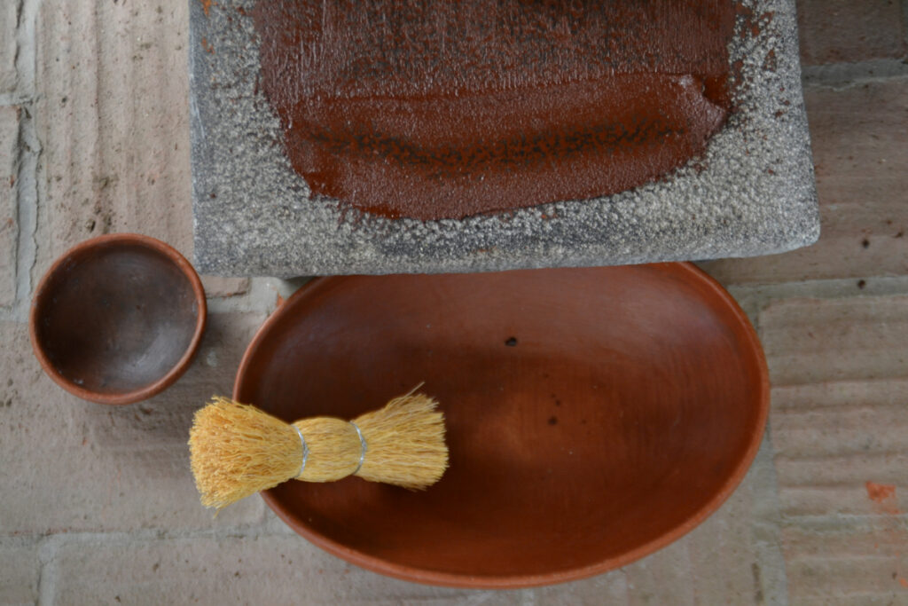 brush for cleaning the metate in bowl