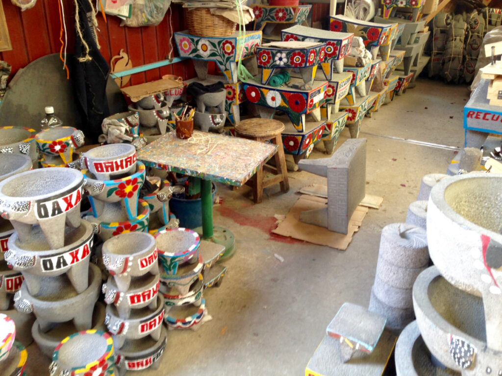 stone bowls and metates in a shop in Mexico
