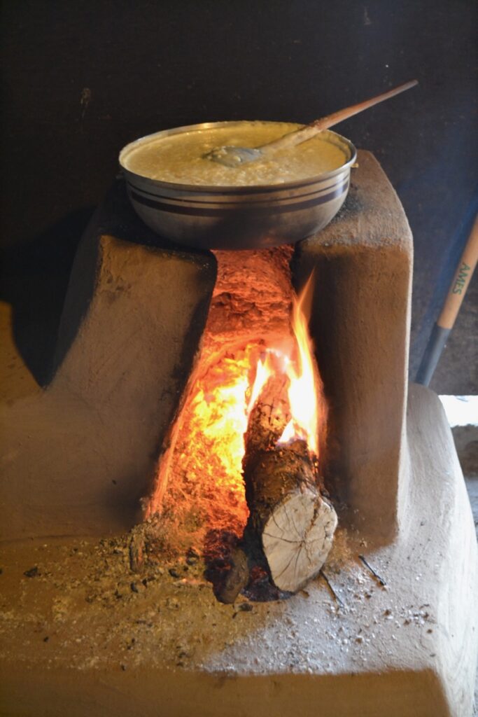 arroz con leche in a pot over a fire