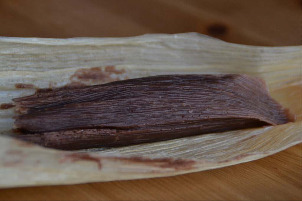 Cooked chocolate tamale